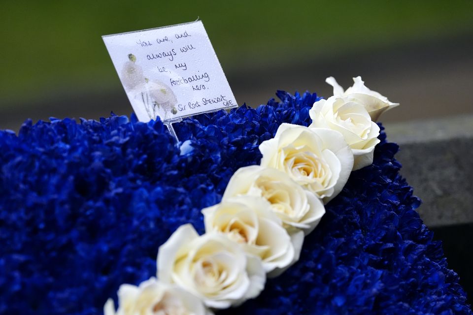 Sir Rod Stewart sent a floral tribute for the funeral of his ‘footballing hero’ Denis Law (Nick Potts/PA)