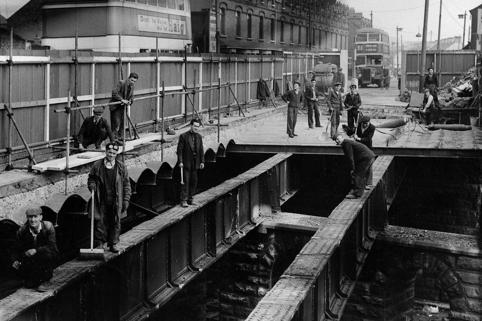 Workmen replace the old Donegall Road bridge spanning the Great Northern Railway main line.  17/3/1954