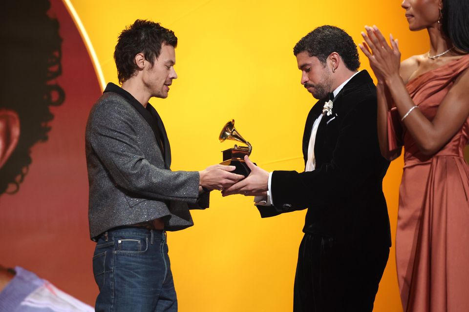 Harry Styles onstage presenting Album of the Year to Bad Bunny during the 68th Grammy Awards wearing Jonathan Anderson's Dior (Credit: Getty Images)