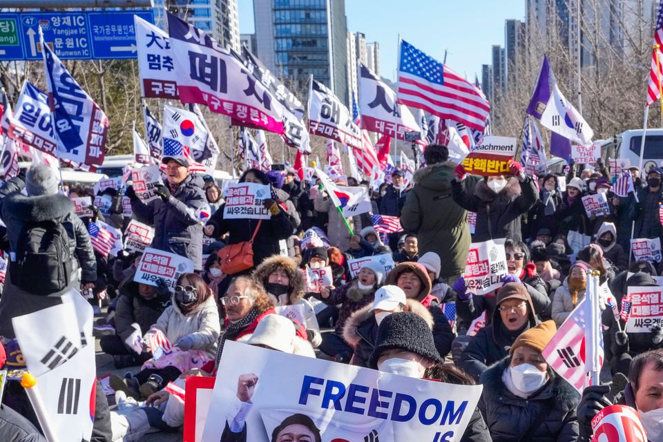 Supporters of impeached South Korean President Yoon Suk Yeol stage a rally to oppose his impeachment (AP/Ahn Young-joon)