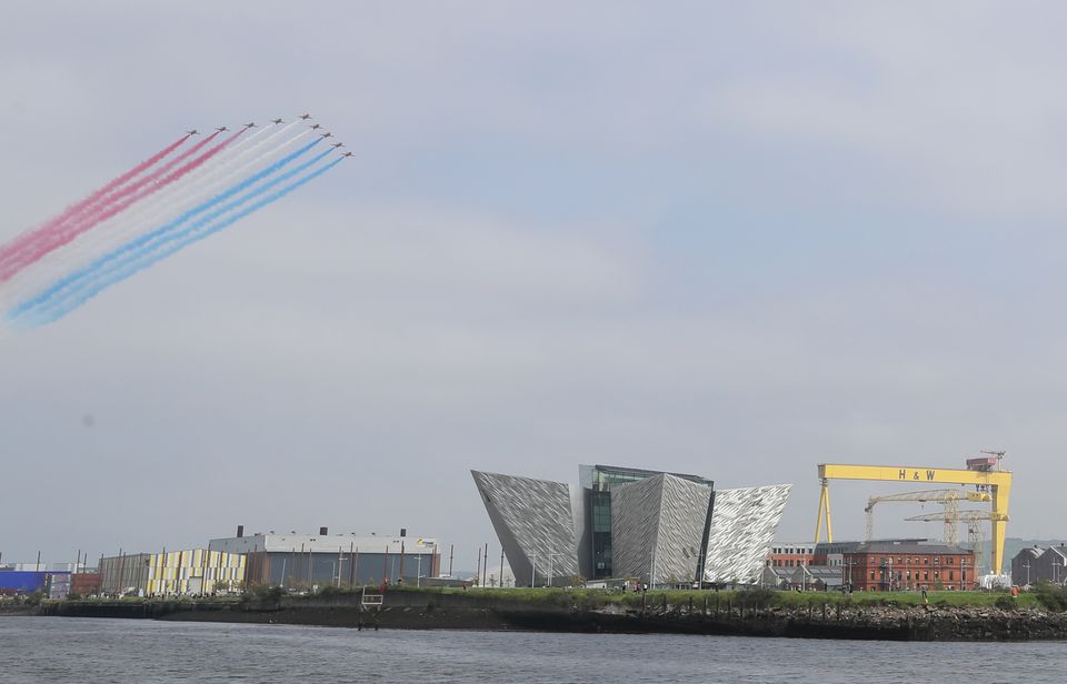 The Red Arrows fly over the Titanic slipway and the Titanic Museum (Brian Lawless/PA)