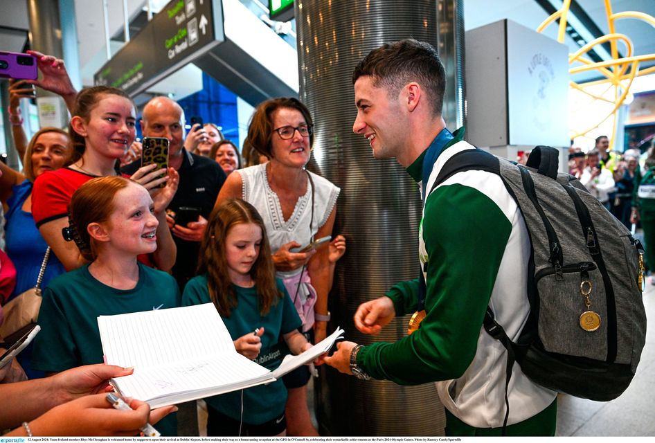 Team Ireland member Rhys McClenaghan is welcomed home by supporters upon his arrival at Dublin Airport, before the team made their way to a homecoming reception at the GPO in O'Connell St, celebrating their remarkable achievements at the Paris 2024 Olympic Games. Photo by Ramsey Cardy/Sportsfile