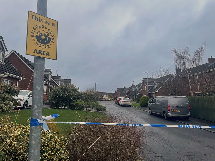 Police remained at the scene on Sunday (Jonathan McCambridge/PA)