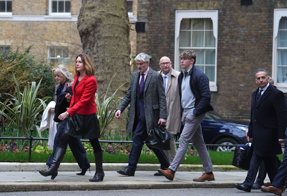 The families of Barnaby Webber, Grace O’Malley-Kumar and Ian Coates arrive in Downing Street, central London (Jordan Pettitt/PA)