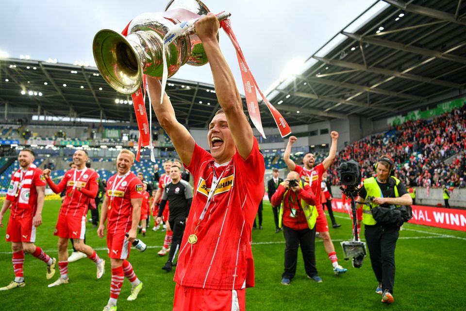 Cliftonville's Rory Hale lifts the Irish Cup