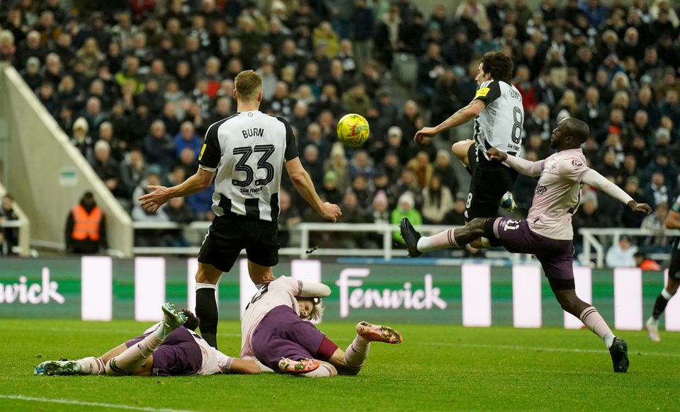 Newcastle’s Sandro Tonali scores his second goal in a 3-1 Carabao Cup quarter-final win over Brentford (Owen Humphreys/PA)