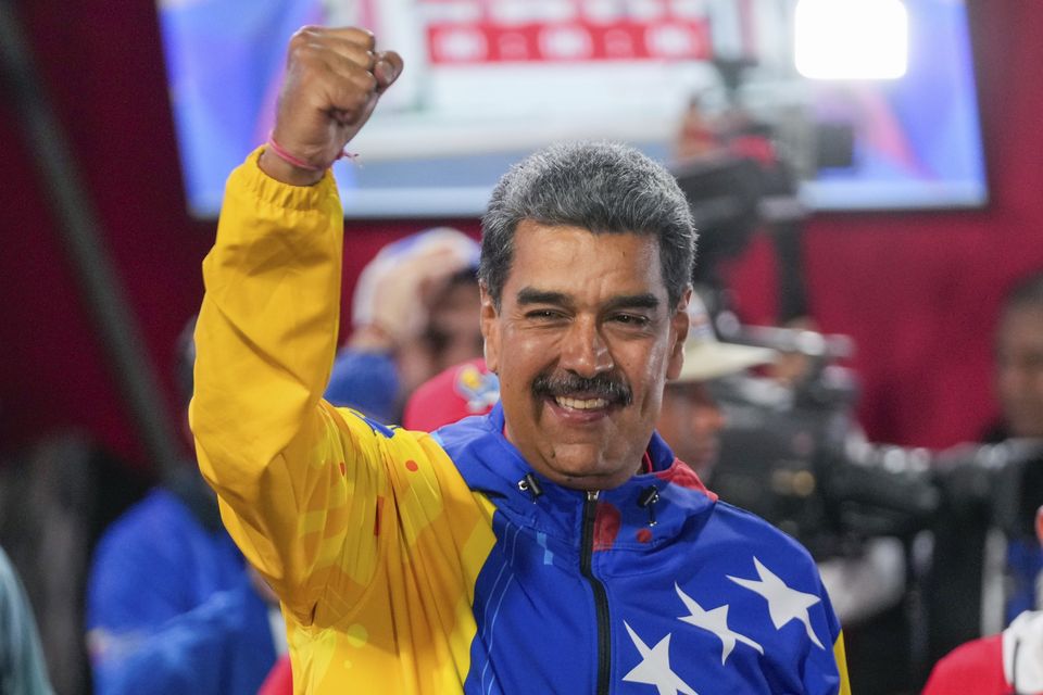 President Nicolas Maduro was declared the winner (AP)