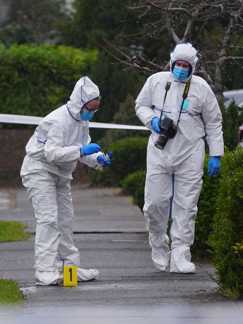 Garda forensics officers near to the scene in the Gainsborough Lawn area of Malahide, Dublin, where a man in his 60s has died (Brian Lawless/PA)