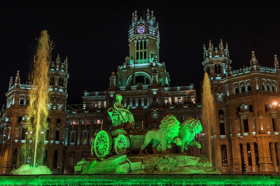 The Cibeles Fountain and Palacio de Comunicaciones in Madrid, illuminated in green as part of Tourism Ireland’s Global Greening initiative, to celebrate the island of Ireland and St Patrick.