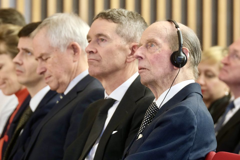 The duke listening to a translation on a set of headphones during the ceremony (Till Budde/British Embassy Berlin/PA)