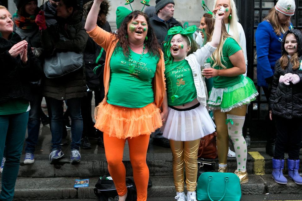 People celebrate at the Mayor of London's St Patrick's Day Parade and Festival in London. Daniel Leal-Olivas/PA Wire.