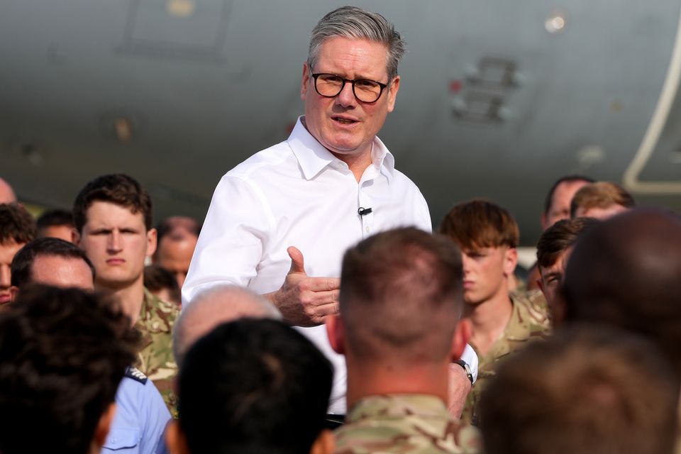 Sir Keir Starmer speaks to soldiers at the RAF base in Akrotiri, Cyprus (Kirsty Wigglesworth/PA)