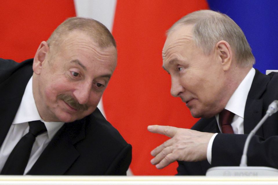 Azerbaijani President Ilham Aliyev with Russian President Vladimir Putin at a meeting in Moscow in April (Gavriil Grigorov/Sputnik/Kremlin Pool/AP)