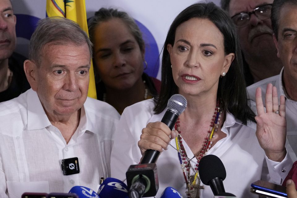 Opposition leader Maria Corina Machado, right, and presidential candidate Edmundo Gonzalez hold a press conference (Matias Delacroix/AP)