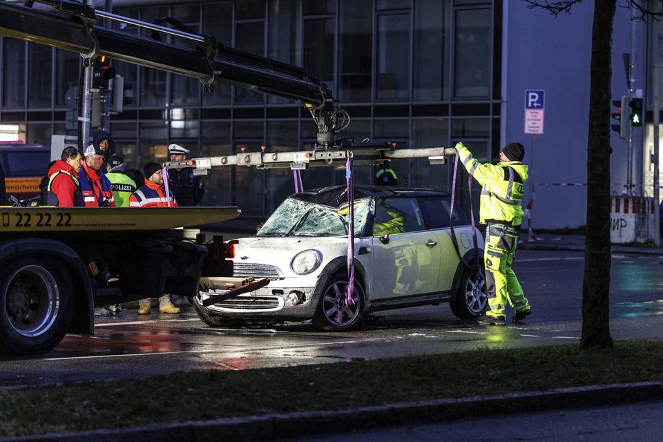 A car at the scene where a driver drove into a union demonstration in Munich (Matthias Balk/dpa via AP)