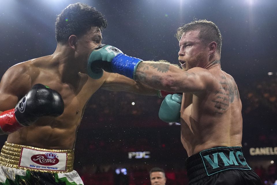 Munguia was frantic in the final round as he searched for a knockout, but Alvarez looked unfazed as he ultimately closed out the bout with a series of decisive blows (John Locher/AP)