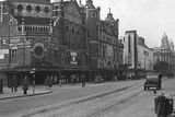 thumbnail: Grand Opera House, The Hippodrome (Odeon), and The Ritz (ABC). In the foreground is a motorcycle and sidecar and a jeep.  5/10/1942
BELFAST TELEGRAPH COLLECTION/NMNI