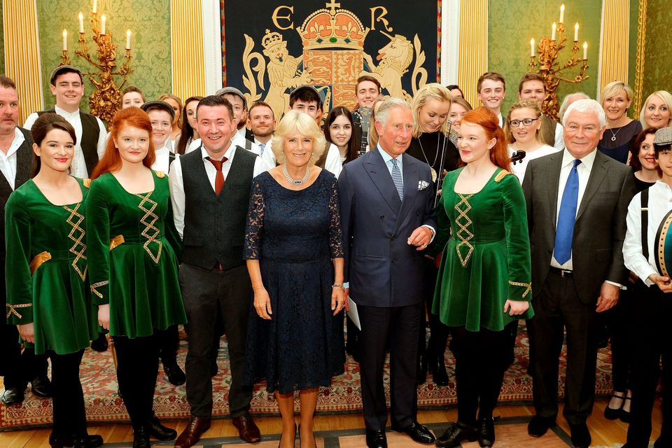 The Prince of Wales and the Duchess of Cornwall pose with performers during a reception and concert featuring performers from Northern Ireland at Hillsborough Castle, in Belfast, Northern Ireland.
