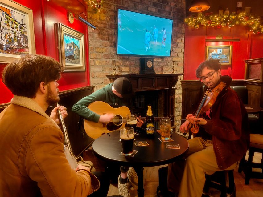 Live musicians entertaining the crowd at the pub's soft launch on Thursday