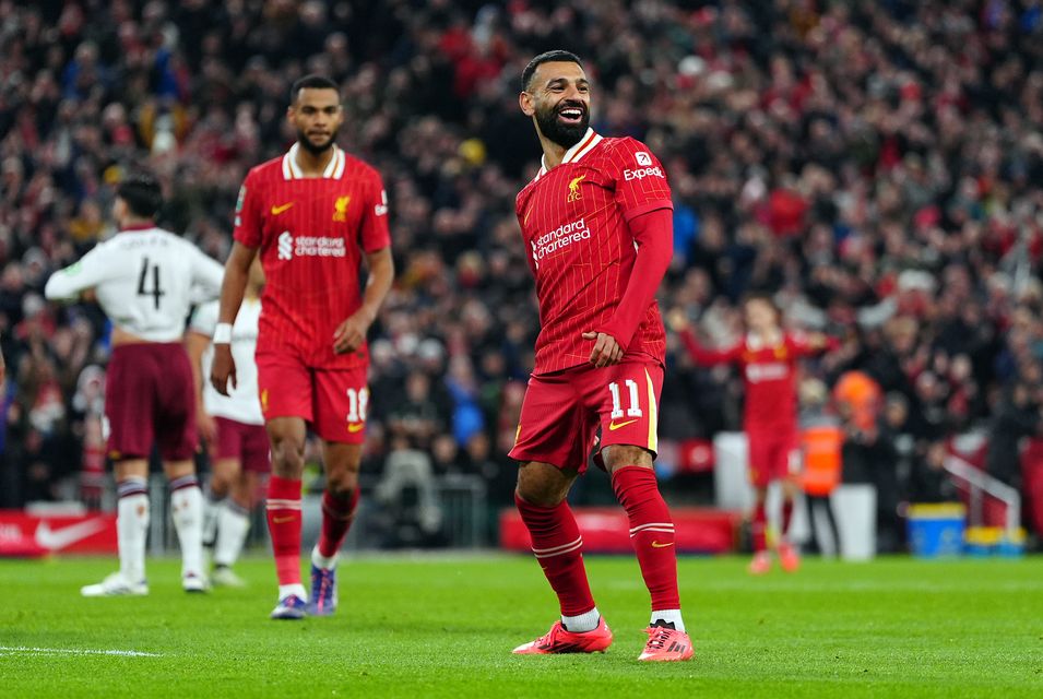 Mohamed Salah celebrates Liverpool’s third goal of the evening (Peter Byrne/PA)