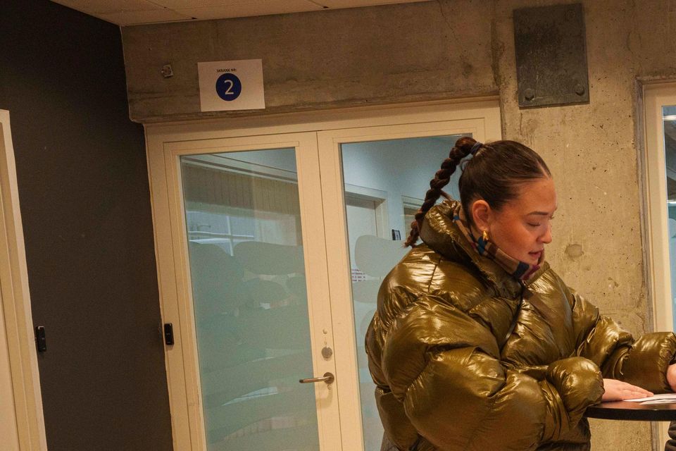 A woman votes in Greenland’s parliamentary elections (Evgeniy Maloletka/AP)