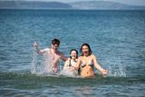 thumbnail: Beach goers enjoying the Northern Ireland weather at Crawfordsburn in Co. Down. Pic: Graham Baalham-Curry/PressEye