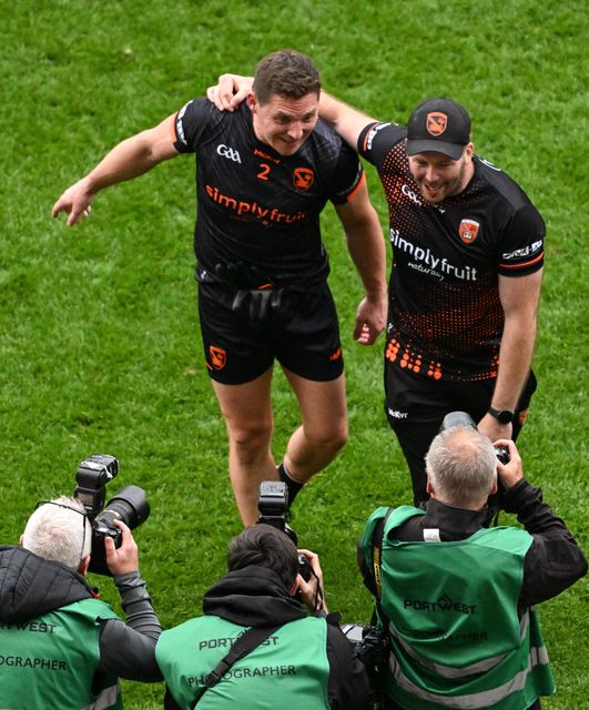 Armagh selector Ciaran McKeever and county star Paddy Burns celebrate the All-Ireland Semi-Final win over Kerry