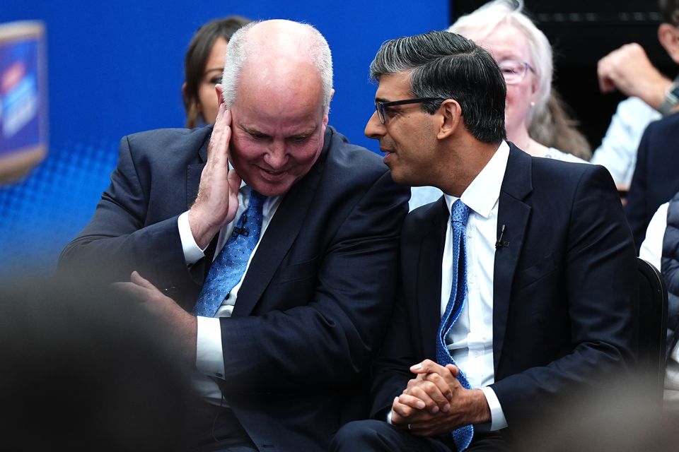 Rishi Sunak talking to Andrew RT Davies during a visit to Rhyl while on the General Election campaign trail (Aaron Chown/PA)