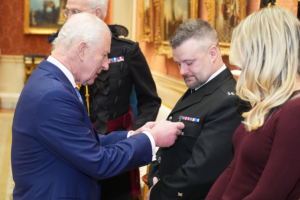 Constable Steven Denniss, of Lincolnshire Police, is decorated with The King’s Gallantry Medal (Aaron Chown/PA)