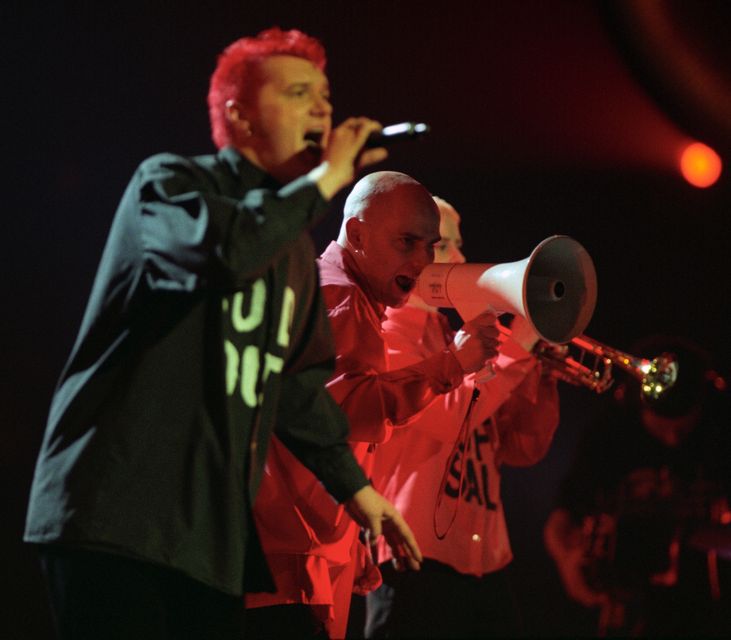 Chumbawamba perform their hit single Tubthumping at the start of the Brit Awards ceremony in 1998 (Fiona Hanson/PA)