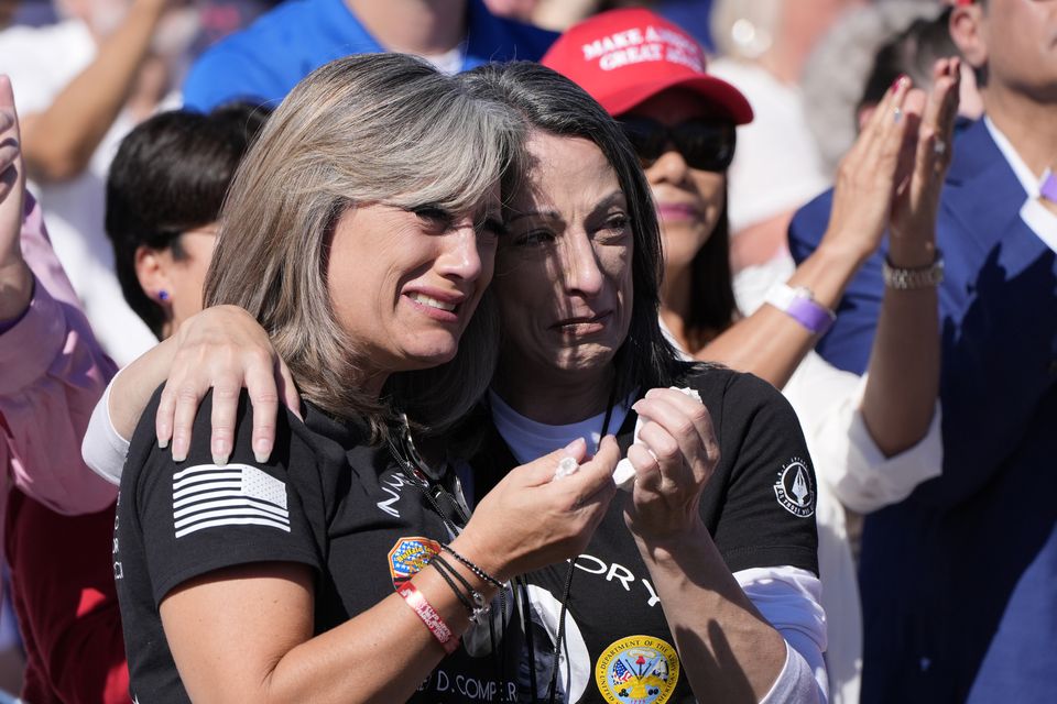 Kelly Comperatore-Meeder, left, and Dawn Comperatore-Schafer, sisters of firefighter Corey Comperatore (Alex Brandon/AP)