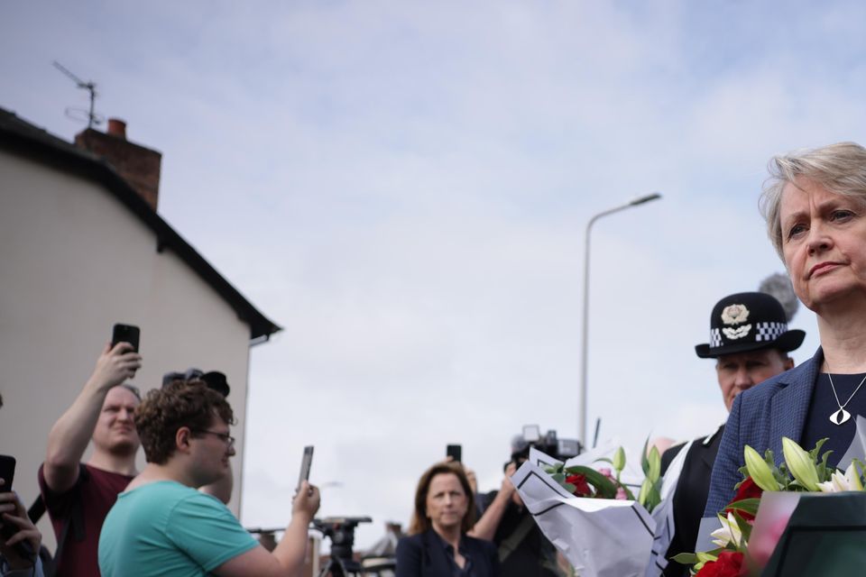 Home Secretary Yvette Cooper attended the scene in Hart Street, Southport, to lay flowers (James Speakman/PA)