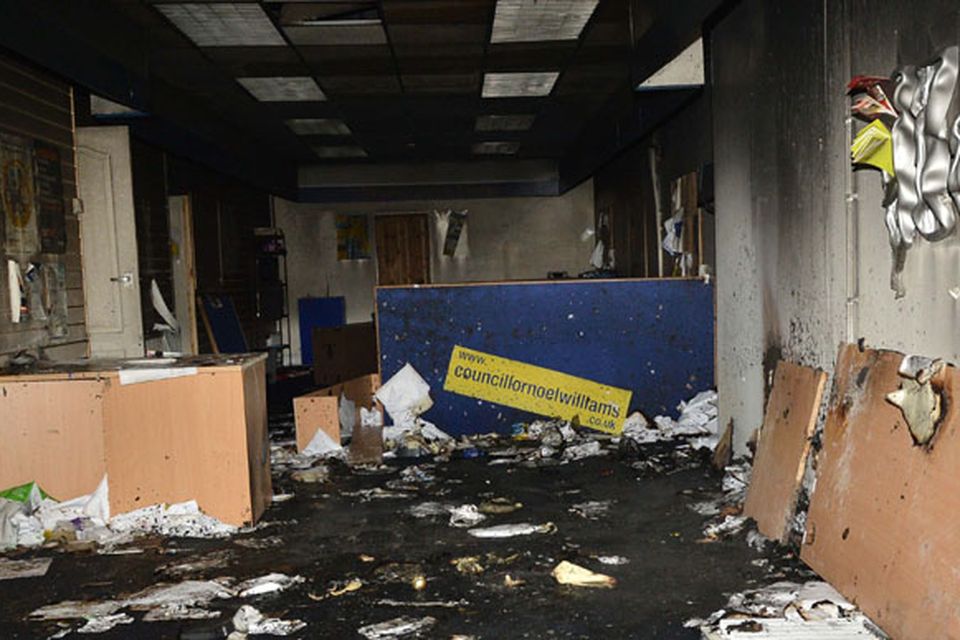 Alliance party office which was set on fire in Carrickfergus after a protest rally over the Union flag