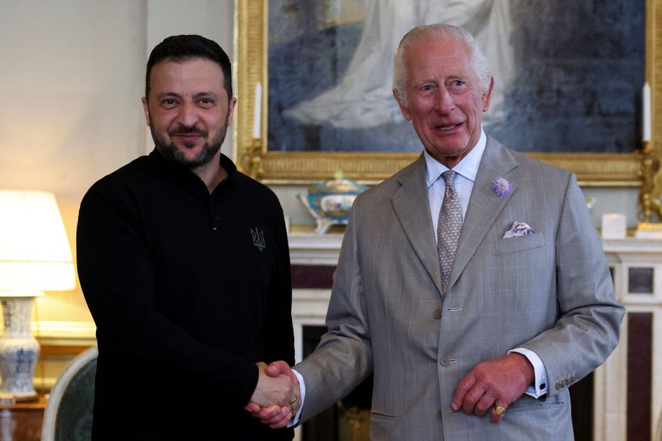 The King shakes hands with Ukrainian President Volodymyr Zelensky (Hollie Adams/PA)