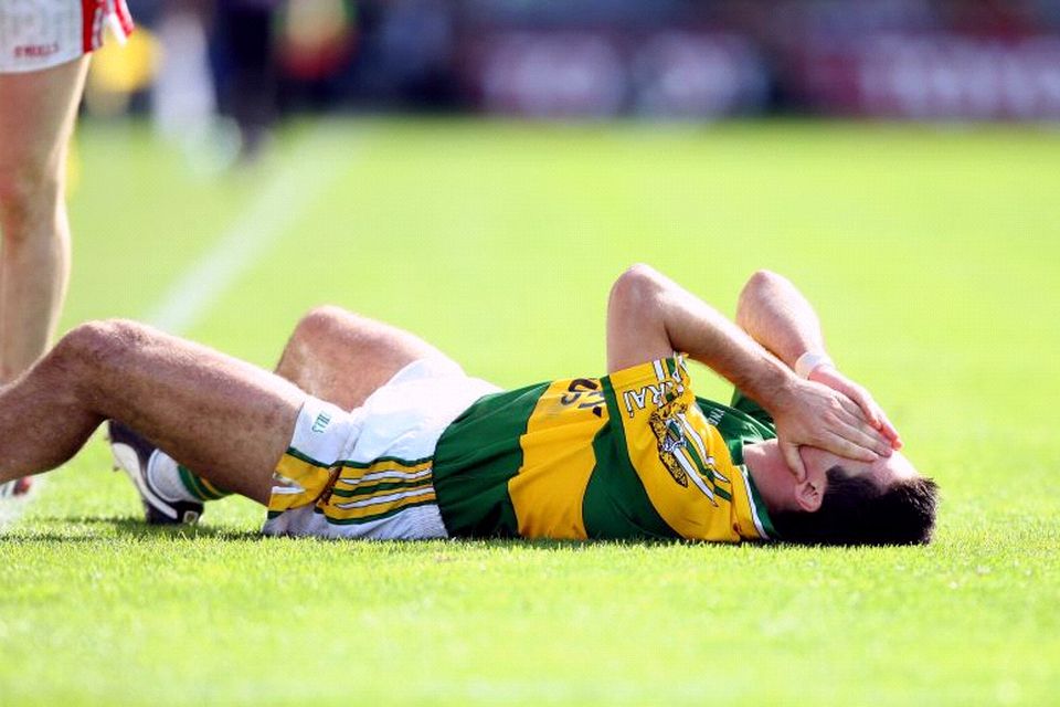 Aidan O'Mahoney is grounded after clashing with Donncha O'Connor of Cork