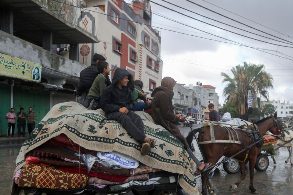 Palestinians are fleeing from the eastern side of the southern Gaza city of Rafah after the Israeli army ordered them to evacuate (AP)
