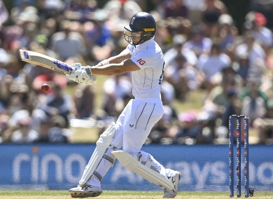 England’s Jacob Bethell bats on his way to an unbeaten half century (John Davidson/Photosport via AP)