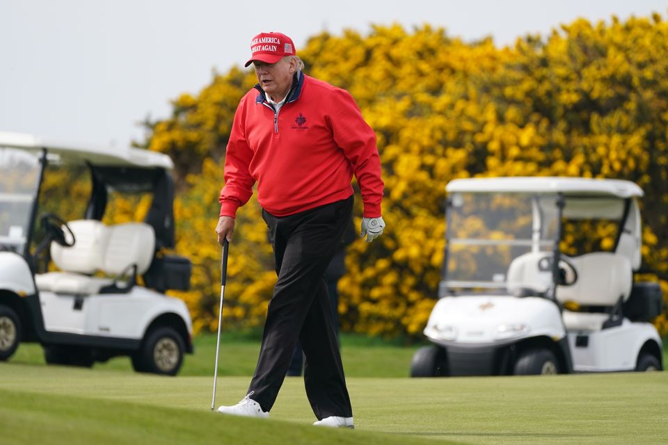 Donald Trump playing golf at his Trump Turnberry course in South Ayrshire (Andrew Milligan/PA)