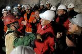 thumbnail: In this photo released by the Chilean presidential press office, Chile's President Sebastian Pinera, center right, greets the second rescued miner Mario Sepulveda after he was rescued from the collapsed San Jose gold and copper mine where he was trapped with 32 other miners for over two months near Copiapo, Chile, early Wednesday Oct. 13, 2010.  (AP Photo/Jose Manuel de la Maza, Chilean presidential press office)