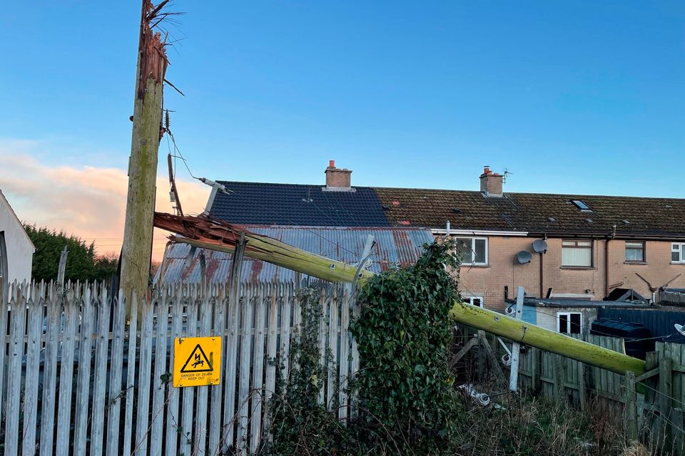 A broken telegraph pole in Culcavy in Co Down after Storm Eowyn left one person dead, more than a million people without power and caused significant travel disruption across the UK and Ireland. Picture date: Saturday January 25, 2025. PA Photo. See PA story WEATHER Winter. Photo credit should read: Jonathan McCambridge/PA Wire