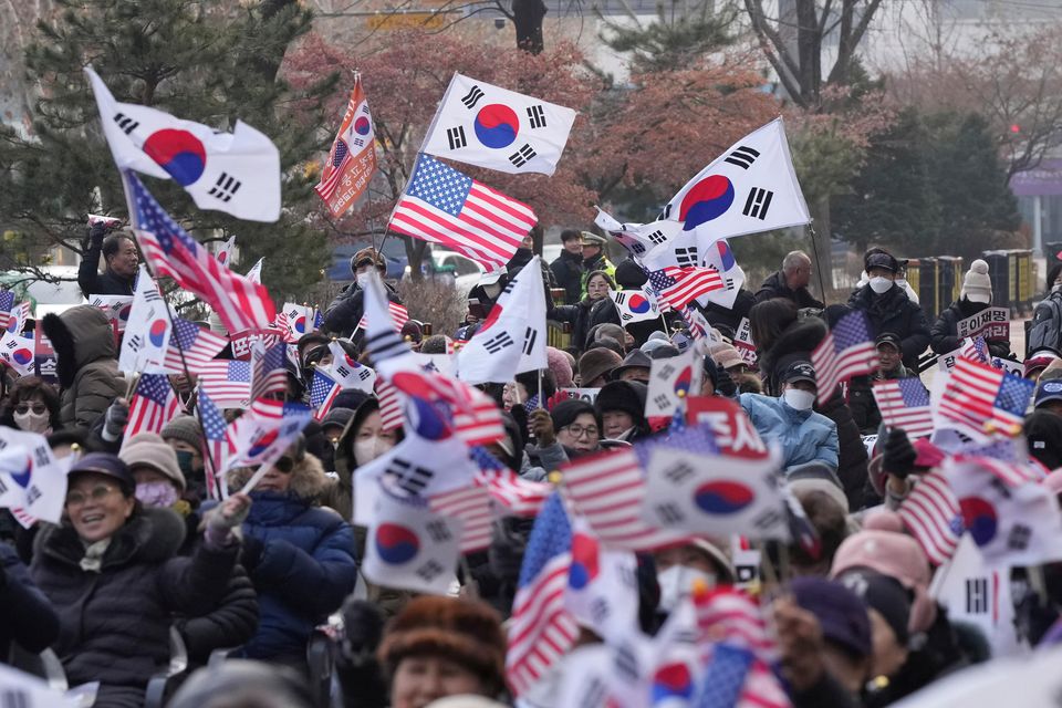 Supporters of impeached South Korean President Yoon Suk Yeol shout slogans during a rally to oppose his impeachment near the Constitutional Court in Seoul (Lee Jin-man/AP)