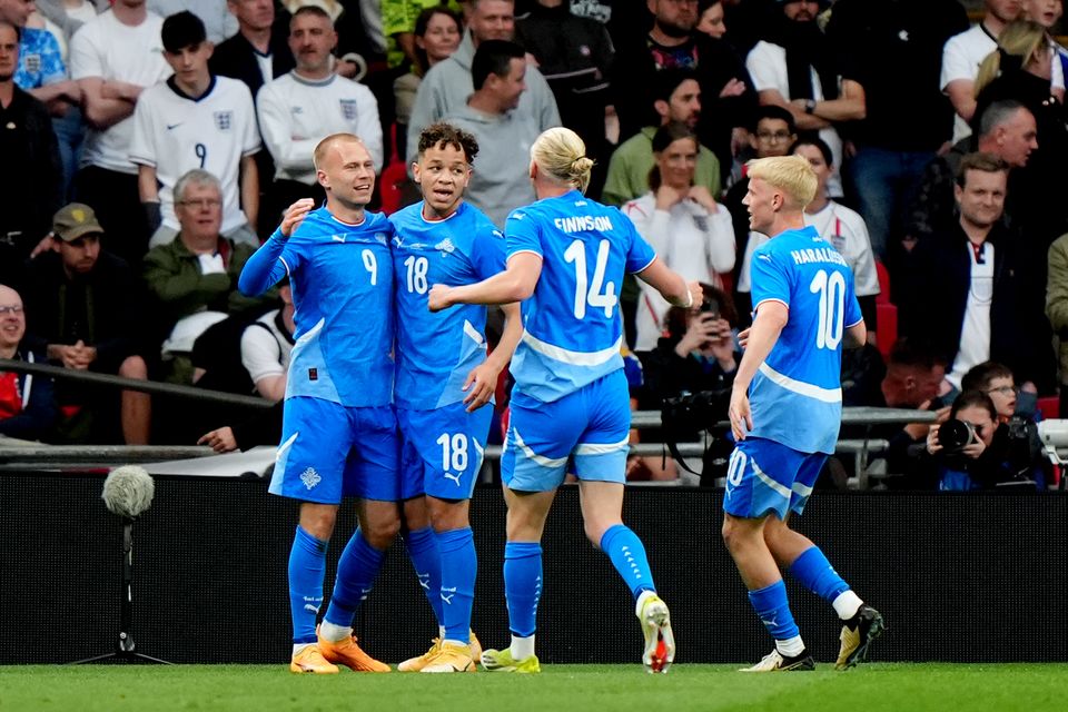 Iceland’s Jon Dagur Thorsteinsson (left) is congratulated after scoring a Wembley winner against England in June (Bradley Collyer/PA)