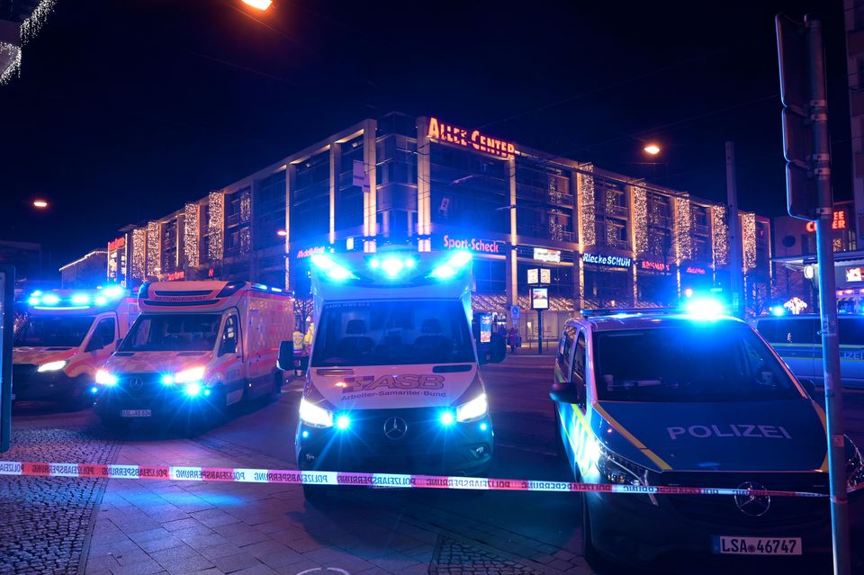 Emergency service vehicles at the Christmas market in Magdeburg, Germany (Heiko Rebsch/dpa via AP)