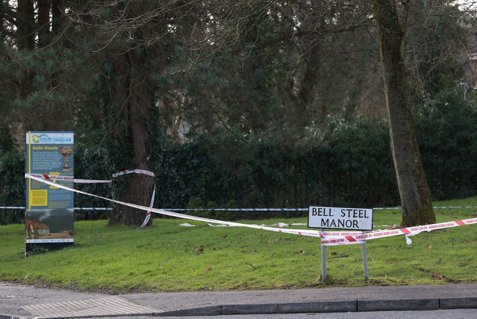 Police tape at the scene in the Bell Steel Manor area of Dunmurry (Liam McBurney/PA)