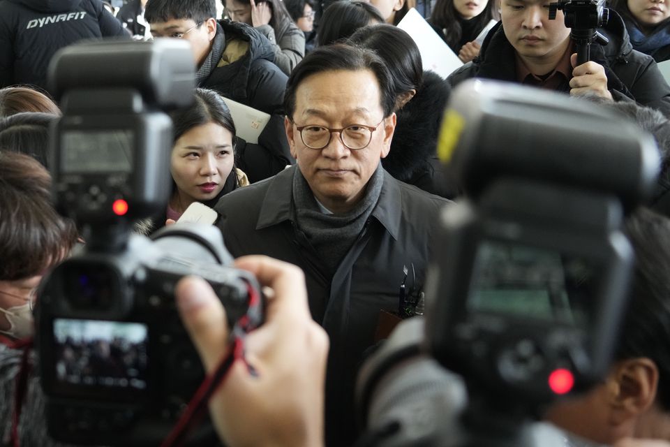 Seok Dong-hyeon, centre, a lawyer and spokesperson for South Korea’s impeached President Yoon Suk Yeol (Ahn Young-joon/AP)