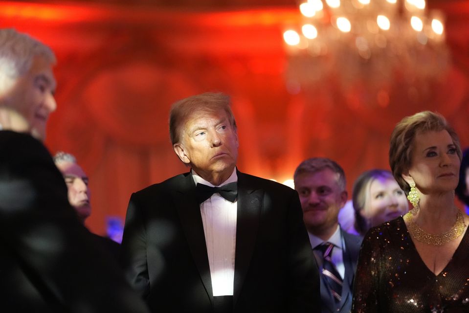 President-elect Donald Trump listens during an America First Policy Institute gala at his Mar-a-Lago estate (Alex Brandon/AP)