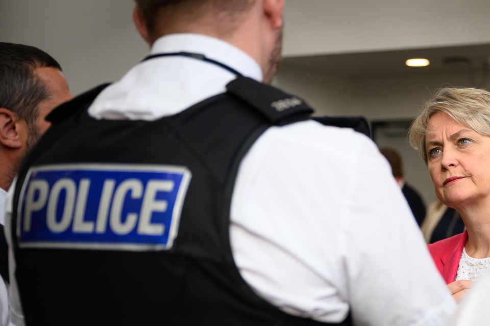 Home Secretary Yvette Cooper speaks to police officers (Leon Neal/PA)