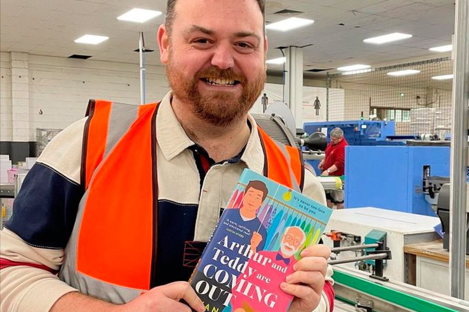 Ryan with the first copy of his new book
