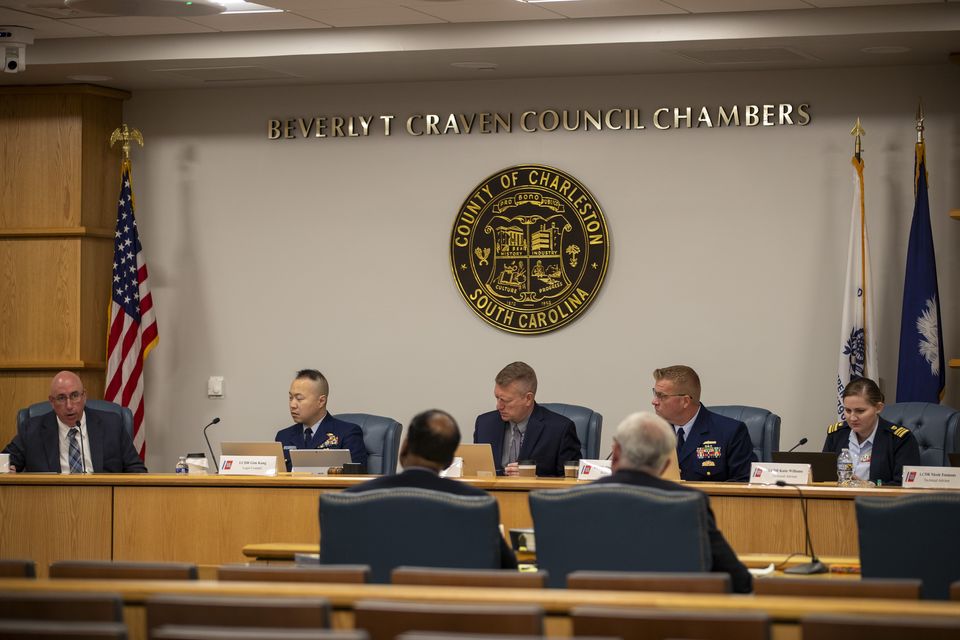 Members of the US coast guard’s Titan Submersible Marine Board of Investigation listen during the formal hearing at the Charleston County Council Chambers (Laura Bilson/The Post And Courier via AP)