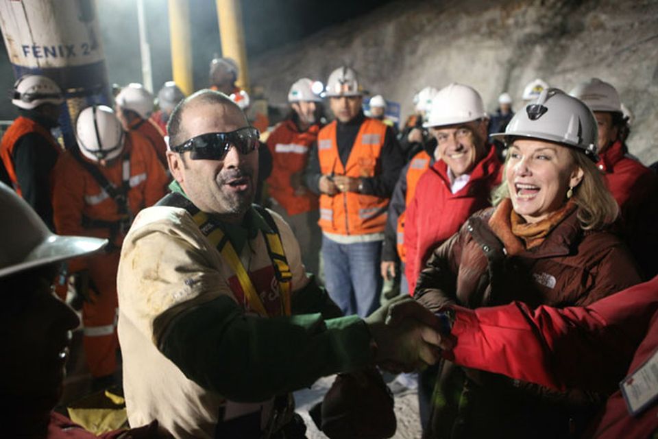 SAN JOSE MINE, CHILE - OCTOBER 12: (NO SALES, NO ARCHIVE) In this handout from the Chilean government, Mario Sepulveda, 39, is the second miner to exit the rescue capsule October 12, 2010 at the San Jose mine near Copiapo, Chile. The rescue operation has begun bringing up the 33 miners, 69 days after the August 5th collapse that trapped them half a mile underground. (Photo by Hugo Infante/Chilean Government via Getty Images)